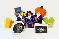 An assortment of rice crisp treats in Halloween themed packaging